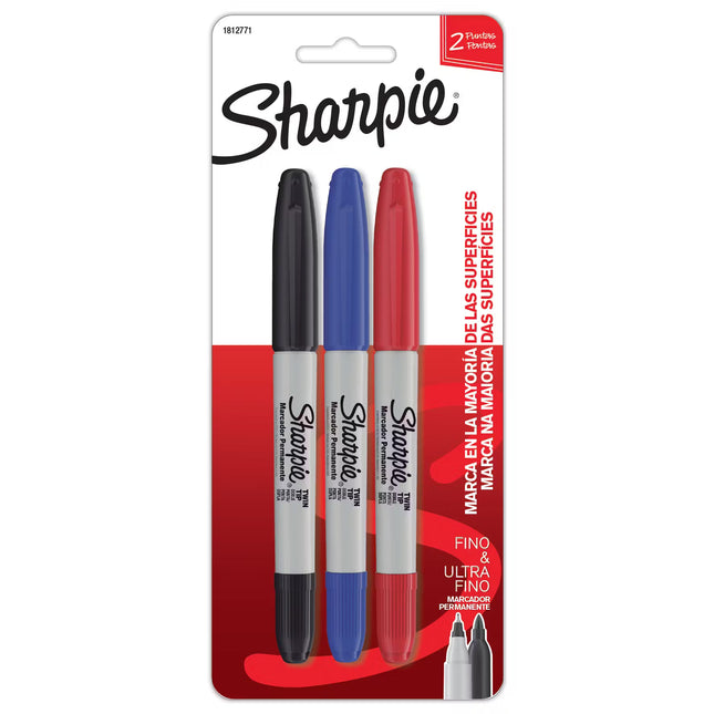 Pack de tres marcadores Sharpie doble punta (fina y biselada) en colores negro, rojo y azul, alineados sobre fondo blanco.